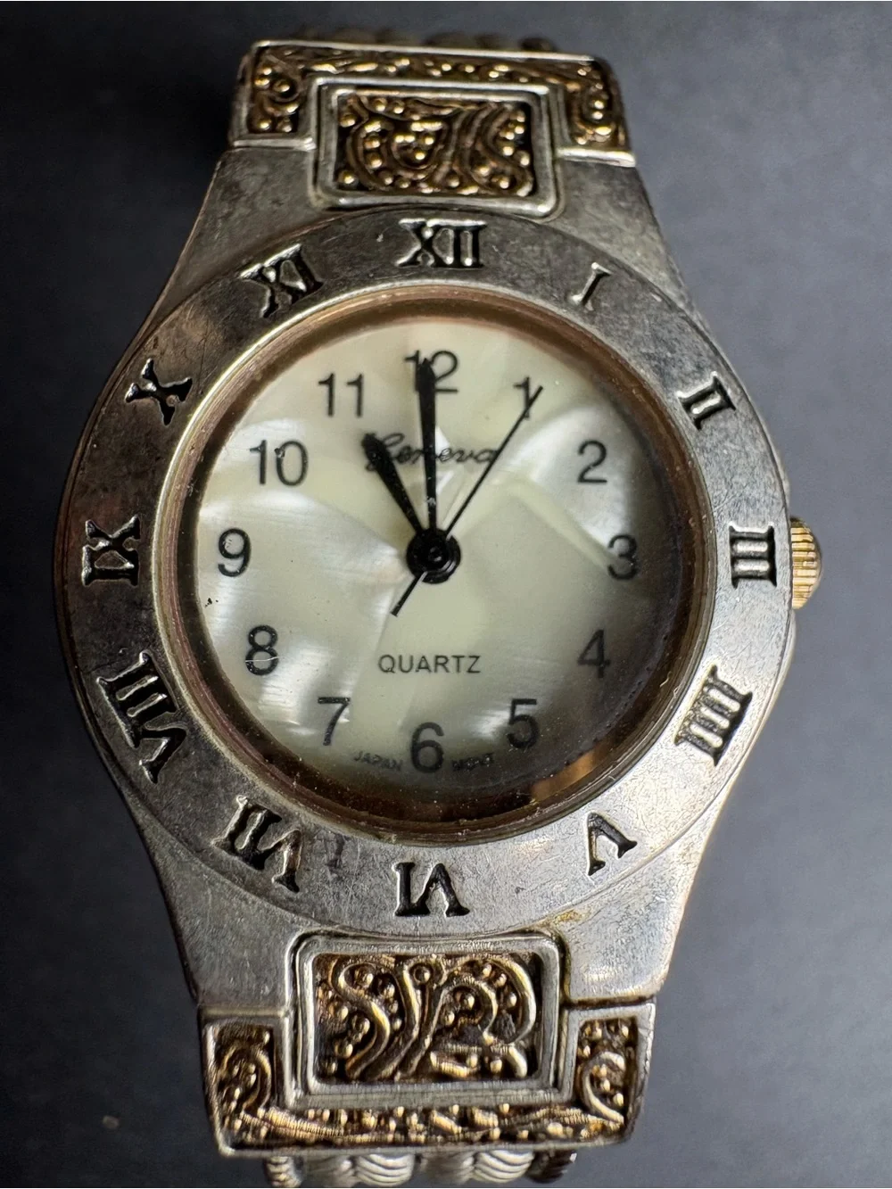 Ornient Women’s Silver-Tone Quartz Wristwatch with Roman Numerals